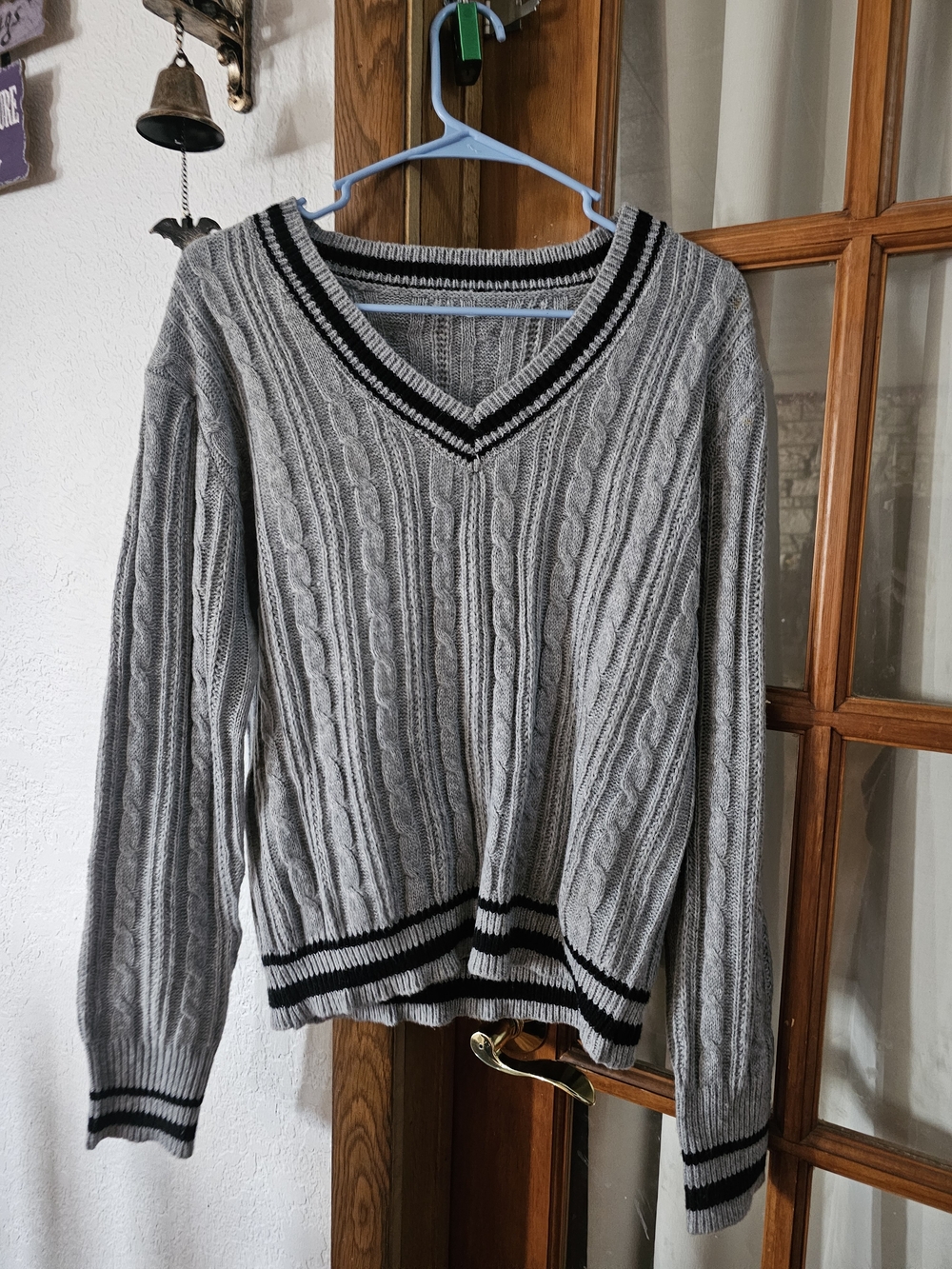 Classic Gray Cable Knit V-Neck Sweater with Black Trim